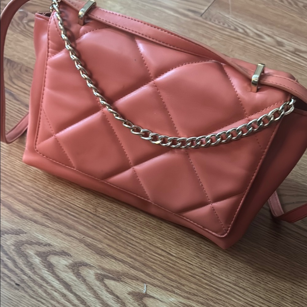 Coral bag with gold details